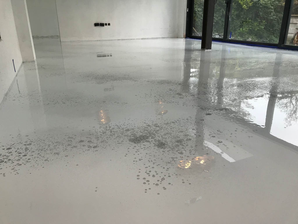 White Metallic Epoxy Floor - Concrete Coatings All Year