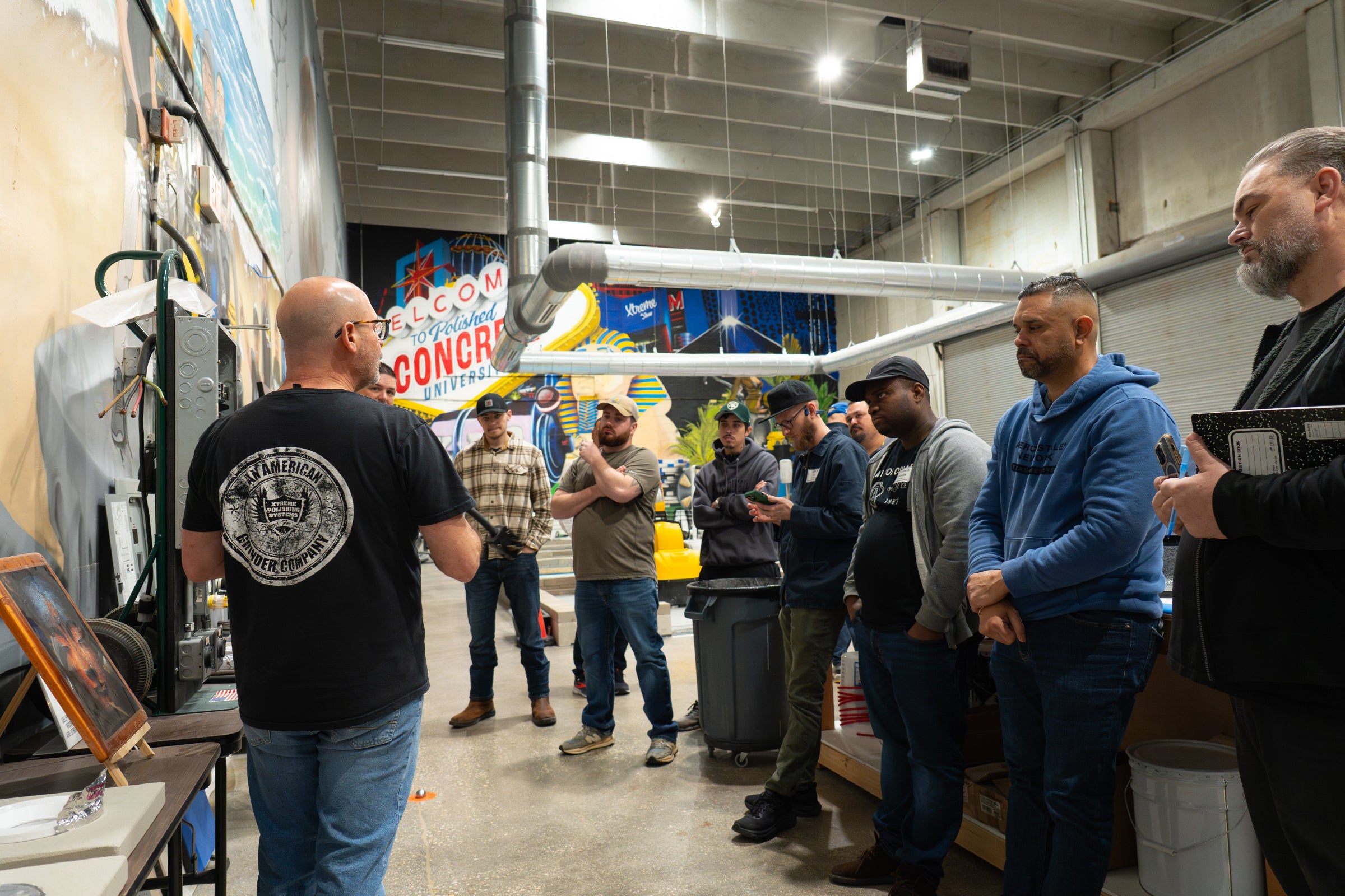 Group of students in Epoxy Training class, Canada location. epoxy floor training and epoxy floor classes.