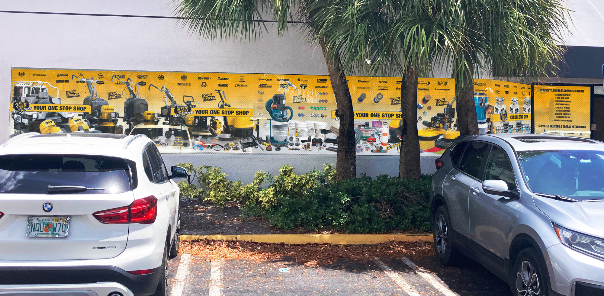Miami location XPS xpress exterior building windows with decals; Miami concrete polishing store and place to get epoxy flooring Miami.