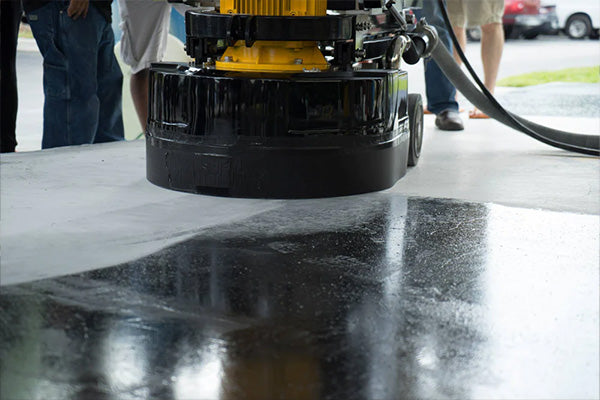 machine removing mastic from concrete floor | XPS blog cover image